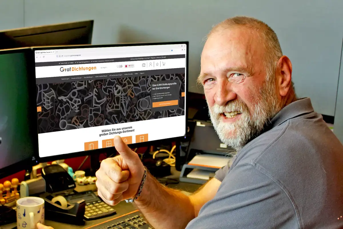 Mitarbeiter freut sich über Shop Launch älterer Mann freut sich über den Graf Dichtungen Online Shop